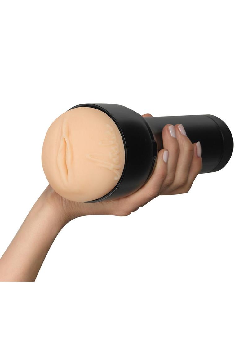 "Elevate pleasure with Kiiroo Natalia Star Stroker - A lifelike adult toy with a powerful motor, customizable speeds, and interactive connectivity. Enhance intimacy today!