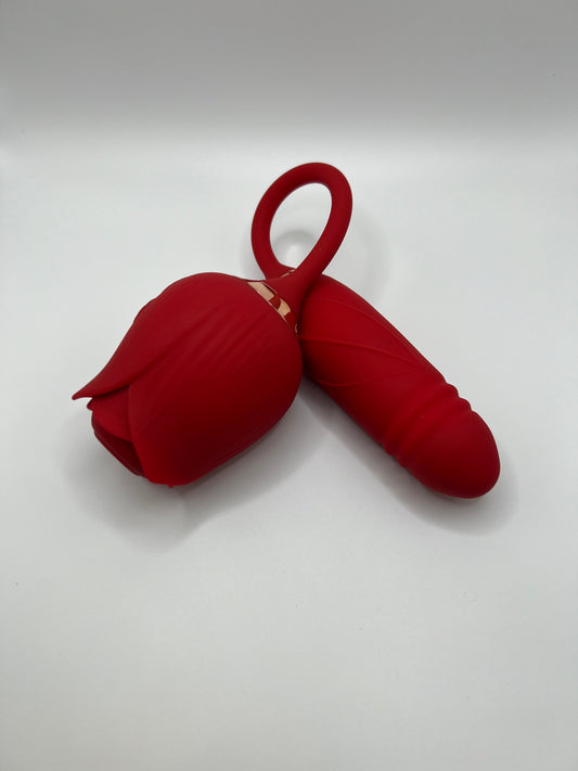 A luxurious red Thrusting Rose vibrator with petal-like details and a bulbous body, offering clitoral suction and thrusting motion for dual stimulation.