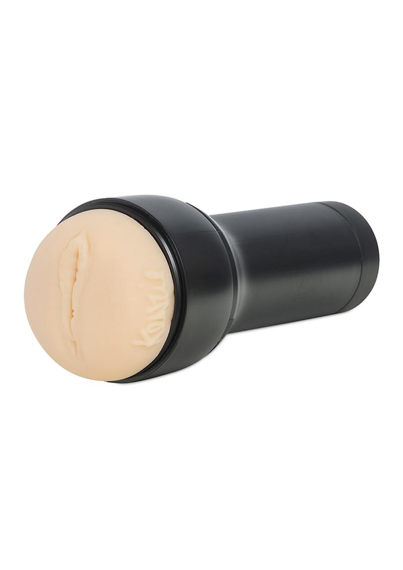 A sophisticated black and vanilla interactive pussy masturbator. Syncs with interactive content for immersive pleasure. Lifelike texture, adjustable vibrations, USB-rechargeable. Elevate intimacy with this cutting-edge pleasure device from Intimate Ideas.